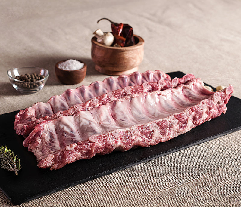 BACK RIBS DE CERDO 1.5 KG.