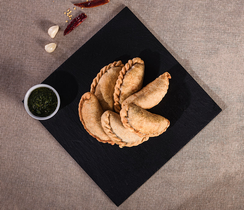 EMPANADAS COCIDAS DE CARNE IMPORTADA. (ORDEN DE 6)